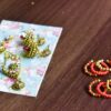Red and gold Indian bridal lehenga for doll