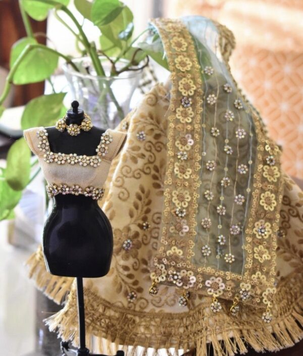 Heavily embellished Indian bridal lehenga for doll