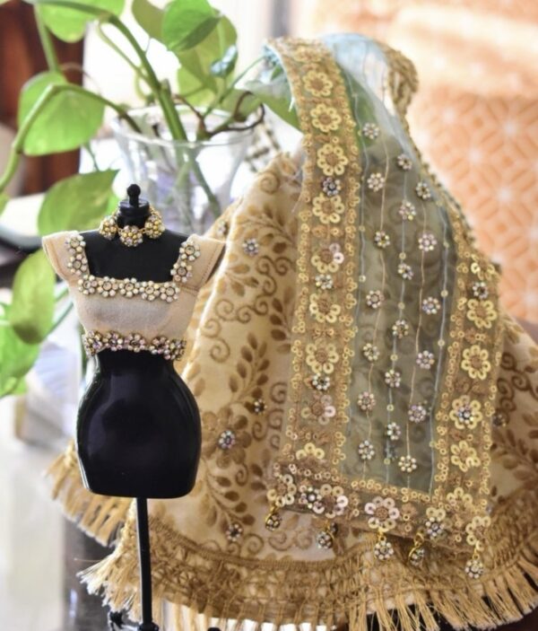 Heavily embellished Indian bridal lehenga for doll