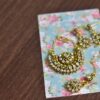 Green and gold embroidered bridal lehenga for Barbie doll