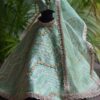 Embroidered pastel green lehenga with accessories for Barbie doll