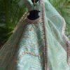 Embroidered pastel green lehenga with accessories for Barbie doll