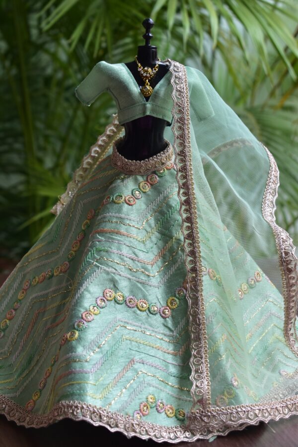 Embroidered pastel green lehenga with accessories for Barbie doll