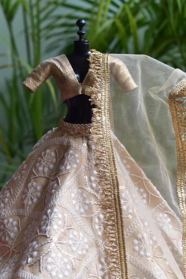 Beige and gold lehenga for Barbie doll