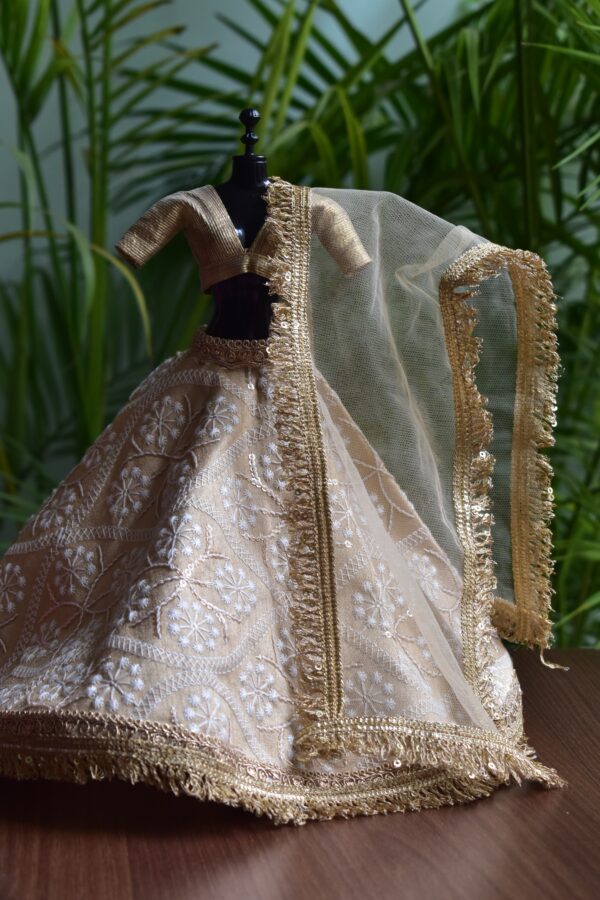 Beige and gold lehenga for Barbie doll