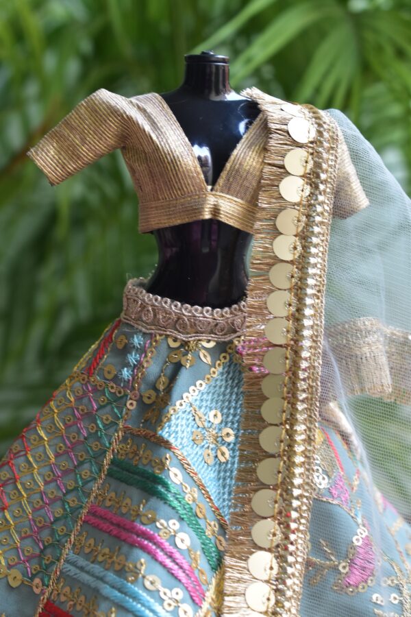 Embellished blue and gold Indian lehenga for Barbie doll