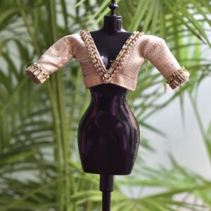 Embellished golden blouse for Barbie doll