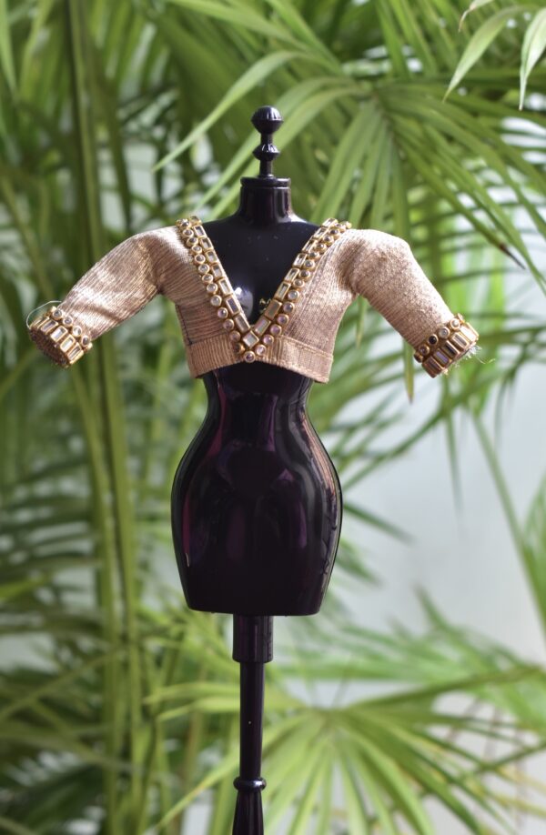 Embellished golden blouse for Barbie doll