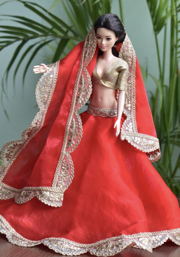 Red and gold festive lehenga for Barbie doll