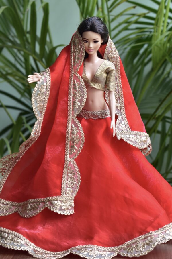 Red and gold festive lehenga for Barbie doll