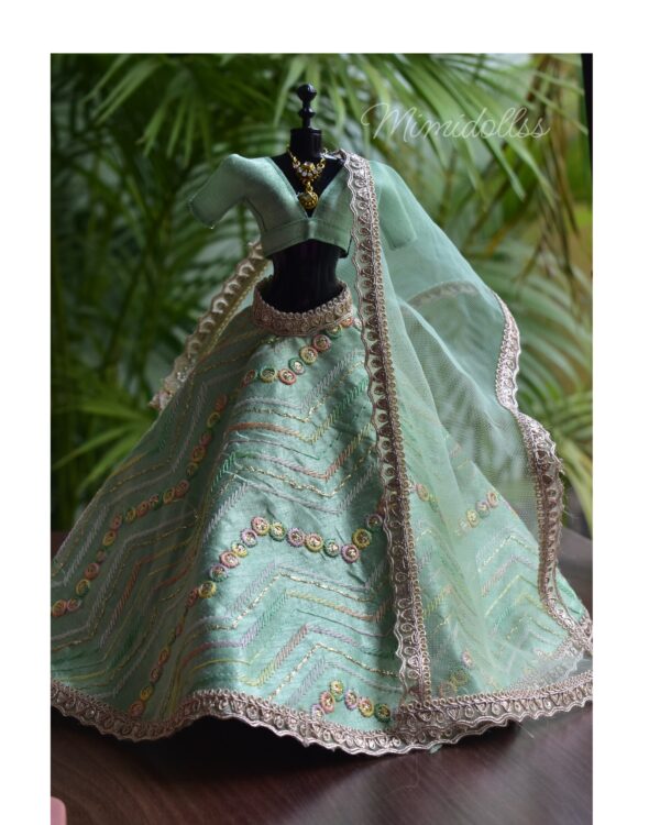 Embroidered pastel green lehenga with accessories for Barbie doll