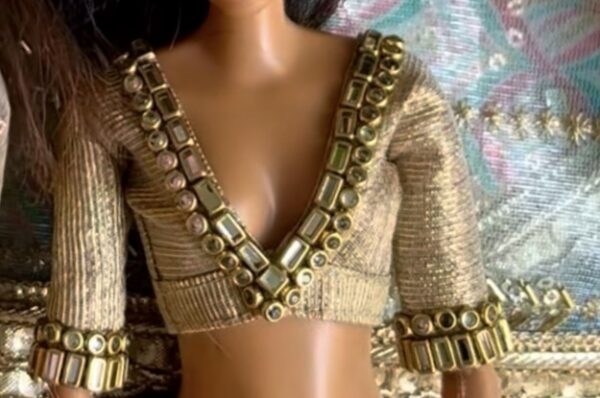 Embellished golden blouse for Barbie doll