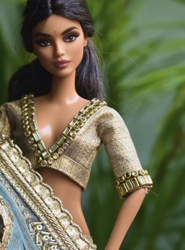 Embellished golden blouse for Barbie doll