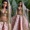 Embroidered peach and gold lehenga for curvy Barbie doll