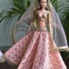 Embroidered peach and gold lehenga for Barbie doll