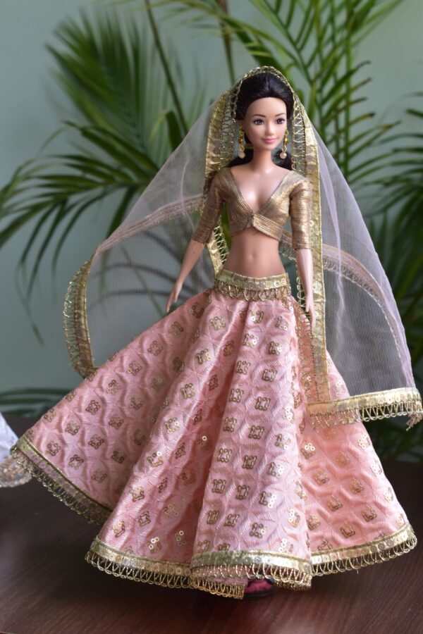 Embroidered peach and gold lehenga for Barbie doll