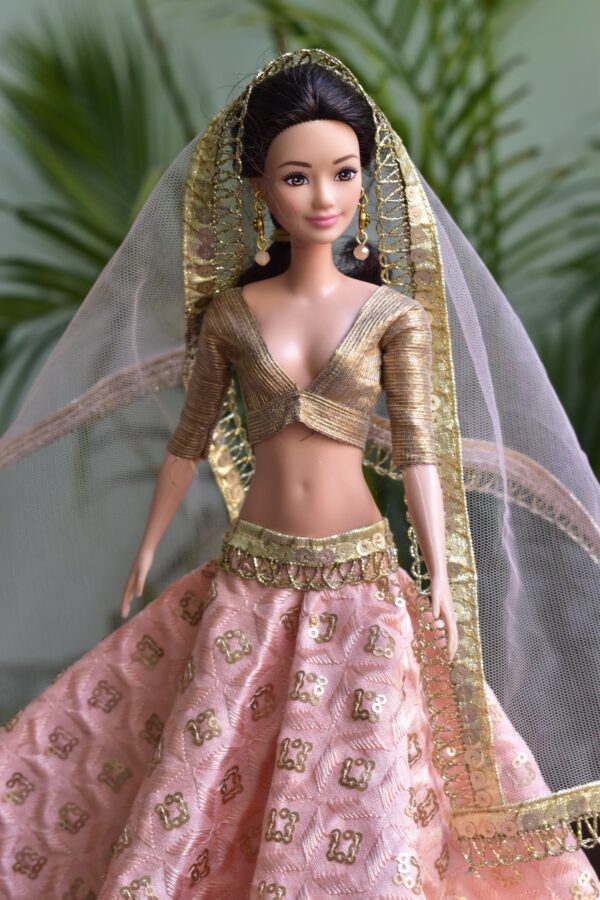 Embroidered peach and gold lehenga for Barbie doll