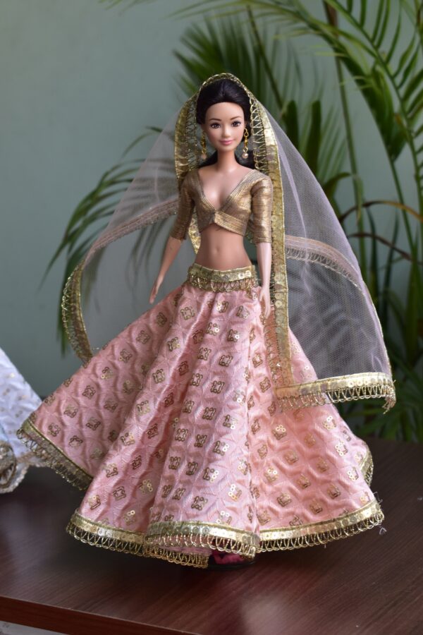 Embroidered peach and gold lehenga for Barbie doll