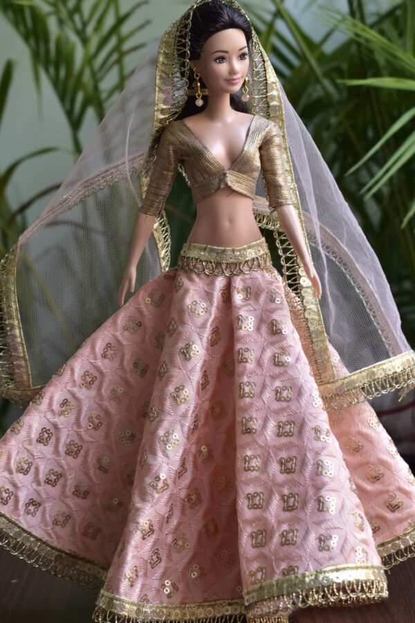 Embroidered peach and gold lehenga for Barbie doll