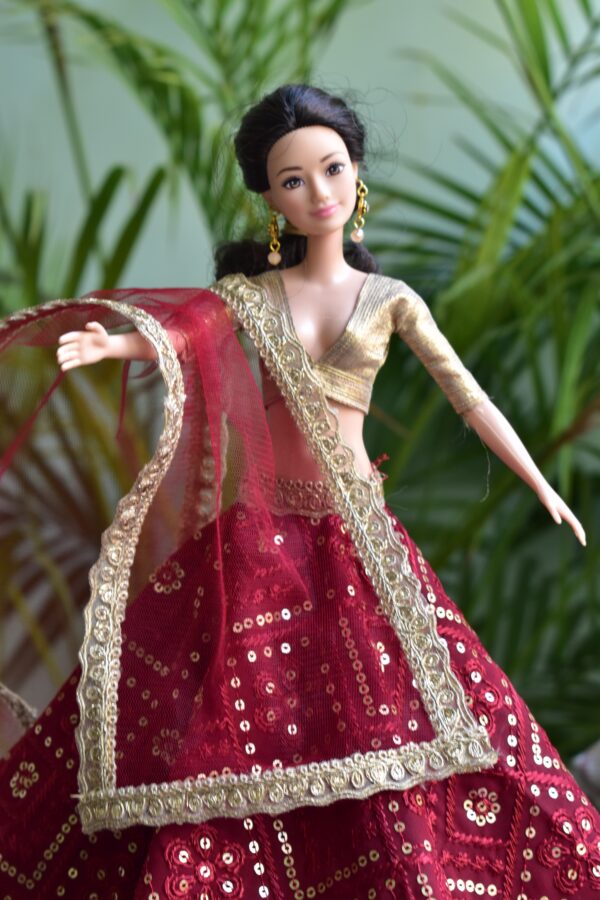 Embroidered maroon and gold lehenga for Barbie doll