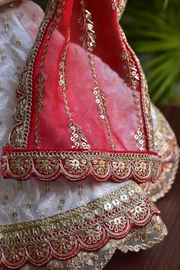 White and red Gujarati Indian bridal lehenga for curvy Barbie doll