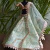 Embroidered green lehenga for Barbie doll