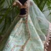 Embroidered green lehenga for Barbie doll