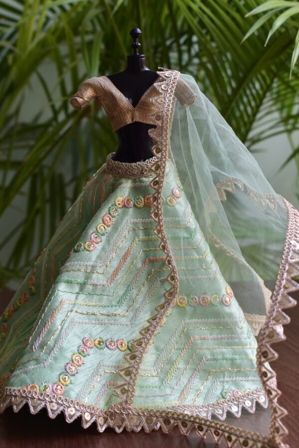 Embroidered green lehenga for Barbie doll