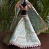 Embroidered green lehenga for Barbie doll