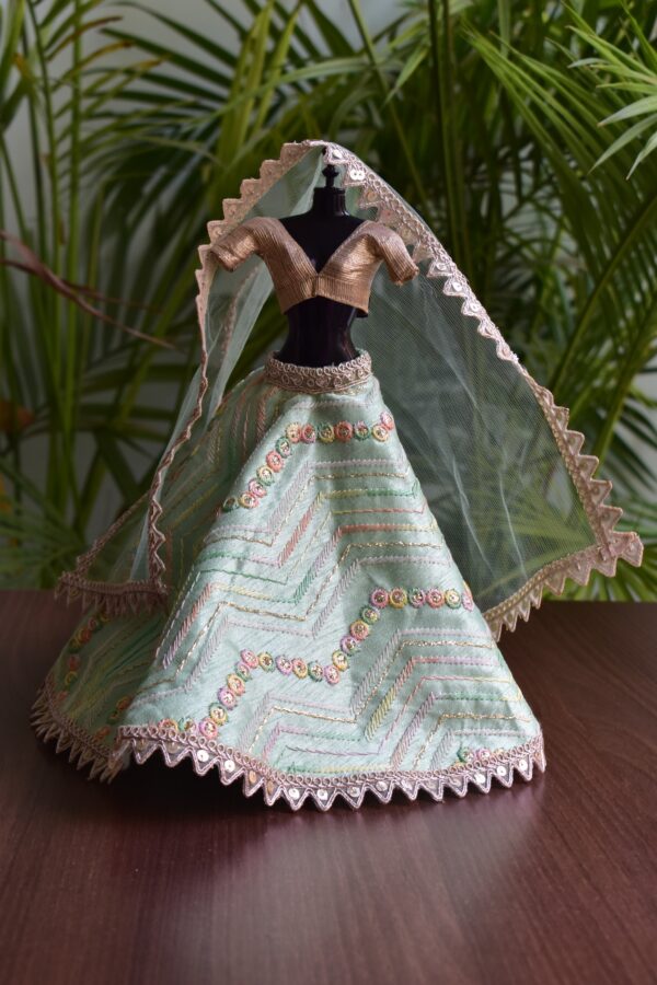 Embroidered green lehenga for Barbie doll