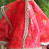Red and gold festive lehenga for Barbie doll