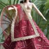 Embroidered maroon and gold lehenga for Barbie doll