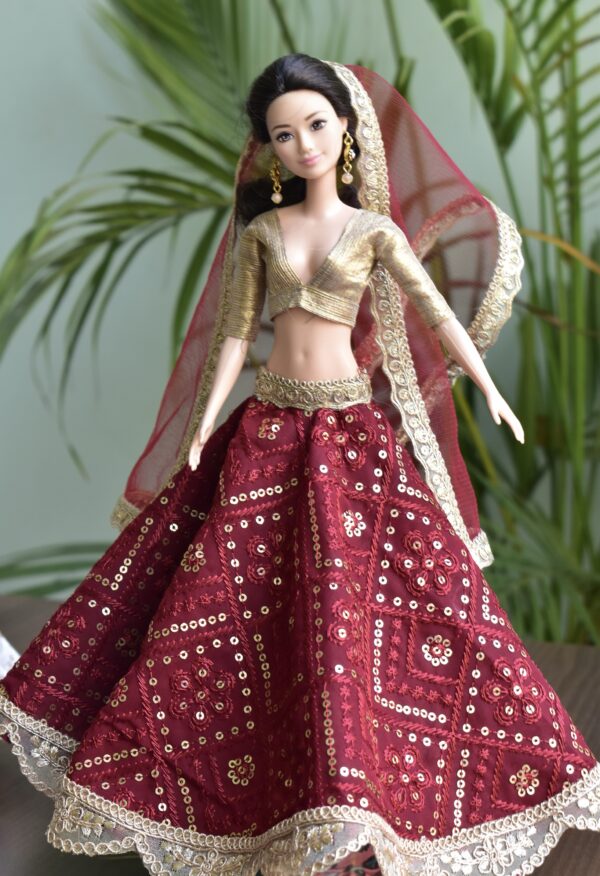 Embroidered maroon and gold lehenga for Barbie doll