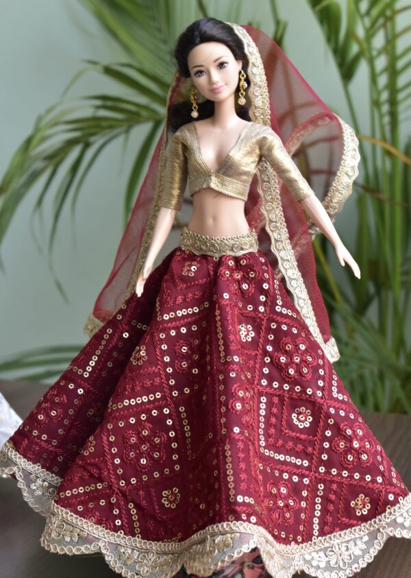 Embroidered maroon and gold lehenga for Barbie doll