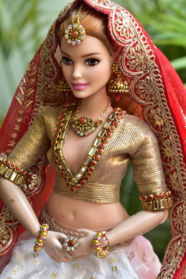 White and red Gujarati Indian bridal lehenga for curvy Barbie doll