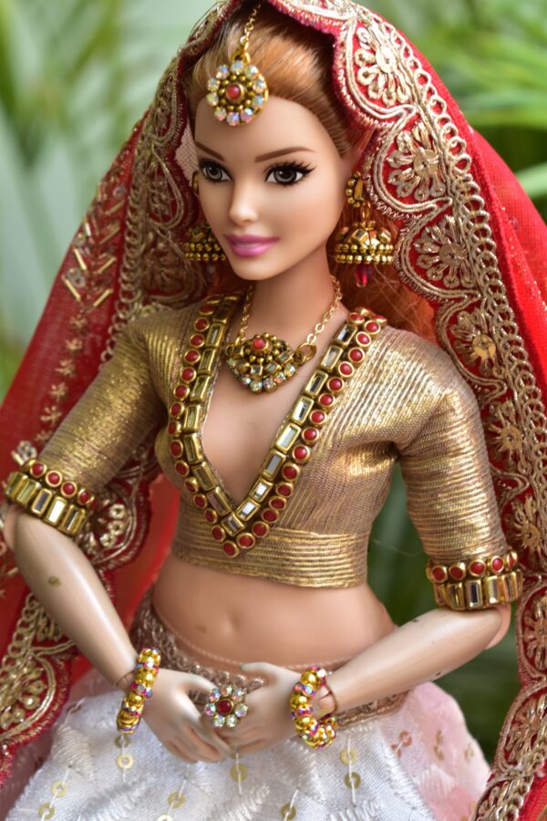 White and red Gujarati Indian bridal lehenga for curvy Barbie doll