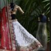 White and red Gujarati Indian bridal lehenga for curvy Barbie doll