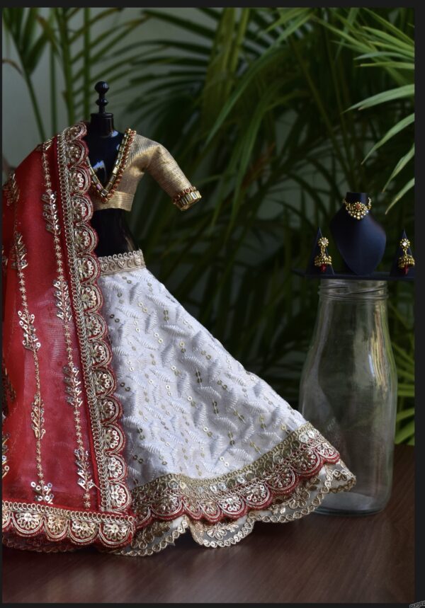 White and red Gujarati Indian bridal lehenga for curvy Barbie doll