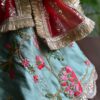 Embroidered teal and red bridal lehenga for Barbie doll