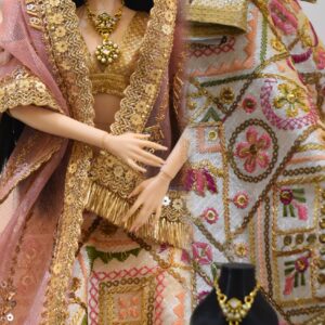 Embroidered Indian bridal lehenga with jewellery for doll